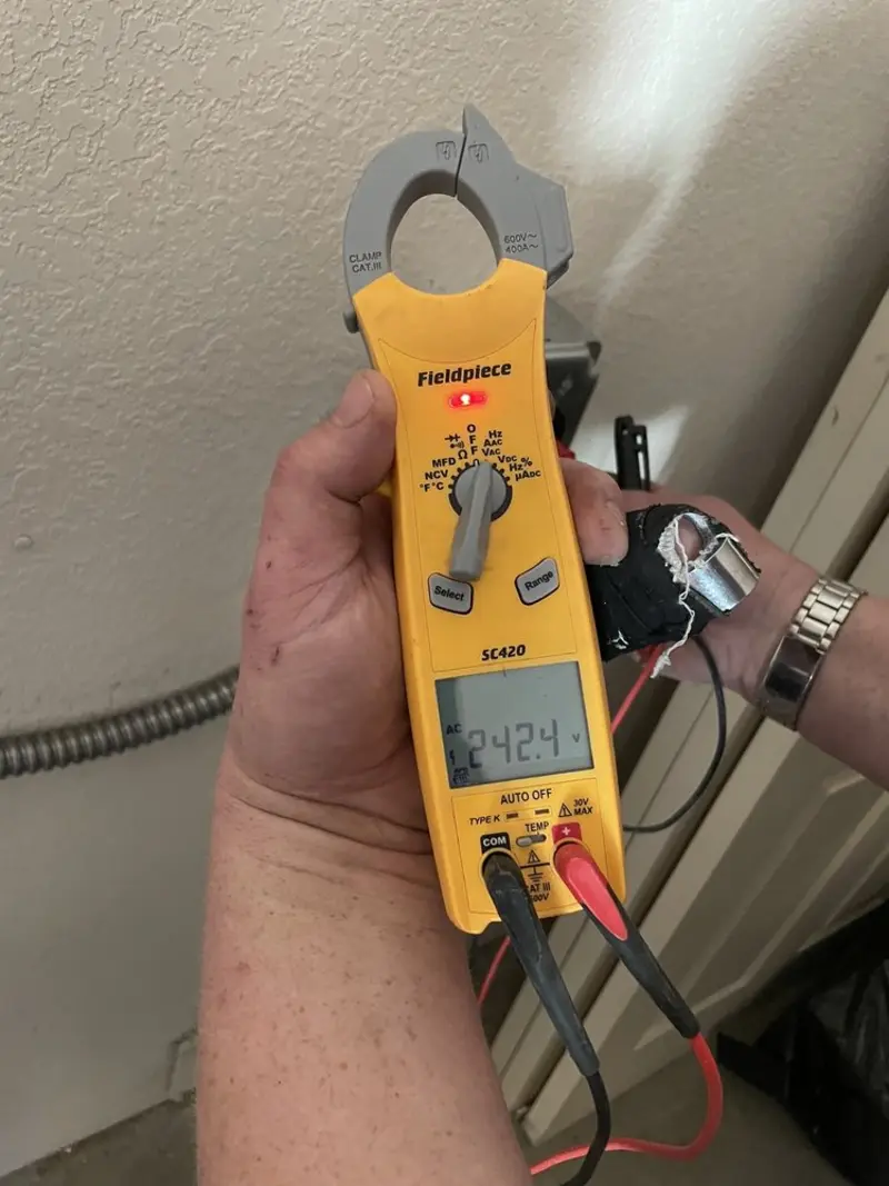 Voltage testing with clamp meter during Generator Installation in Hazel Crest